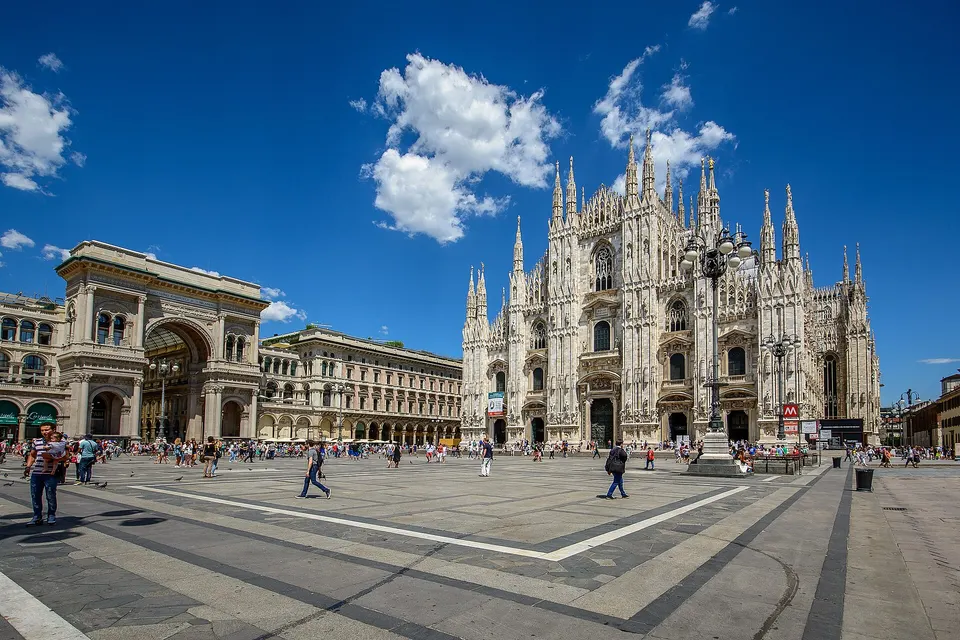 Cathedral square with the Galleria Vittorio Emanuele II on the left, and the Milan Cathedral on the right.